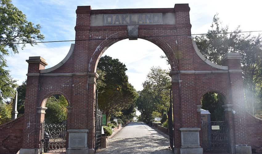 The brick gate entrance to historic Oakland Cemetery in Atlanta.