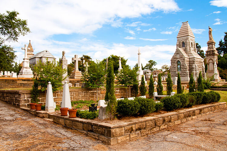 A view of trees and mausoleums at Oakland Cemetery Atlanta